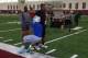 FSU defensive back Lamarcus Brutus encourages high school campers to keep low during Friday's workouts inside FSU's indoor practice facility.