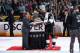 LOS ANGELES, CA - JUNE 13: Justin Williams #14 of the Los Angeles Kings is presented with the Conn Smythe Trophy by NHL Commissioner Gary Bettman after helping his team defeat the New York Rangers in the second overtime period of Game Five of the 2014 NH