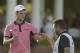 Jun 14, 2014; Pinehurst, NC, USA; Martin Kaymer (left) celebrates with caddie Craig Connolly (right) on the 18th green during the third round of the 2014 U.S. Open golf tournament at Pinehurst Resort Country Club - #2 Course. Mandatory Credit: Jason Getz-