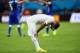 MANAUS, BRAZIL - JUNE 14: A dejected Jack Wilshere of England looks down as Italy celebrate defeating England 2-1 during the 2014 FIFA World Cup Brazil Group D match between England and Italy at Arena Amazonia on June 14, 2014 in Manaus, Brazil. (Photo b