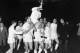 John White (second left among the players) joins his team-mates celebrating Spurs' European Cup Winners' Cup win over Atletico Madrid in 1962-63.