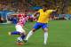 SAO PAULO, BRAZIL - JUNE 12: Darijo Srna of Croatia and Hulk of Brazil battle for the ball during the 2014 FIFA World Cup Brazil Group A match between Brazil and Croatia at Arena de Sao Paulo on June 12, 2014 in Sao Paulo, Brazil. (Photo by Christopher