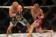 Jul 6, 2013; Las Vegas, NV, USA; Cub Swanson and Dennis Siver during their Featherweight Bout at the MGM Grand Garden Arena. Mandatory Credit: Jayne Kamin-Oncea-USA TODAY Sports