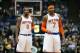 MINNEAPOLIS, MN - MARCH 5: J.R. Smith #8 and Carmelo Anthony #7 of the New York Knicks look on during the game against the Minnesota Timberwolves on March 5, 2014 at Target Center in Minneapolis, Minnesota. NOTE TO USER: User expressly acknowledges and ag