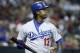 PHOENIX, AZ - MAY 18: Hanley Ramirez #13 of the Los Angeles Dodgers walks back to the dugout after striking out against the Arizona Diamondbacks during a MLB game at Chase Field on May 18, 2014 in Phoenix, Arizona. (Photo by Ralph Freso/Getty Images)
