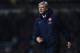 LONDON, ENGLAND - DECEMBER 26: Arsene Wenger manager of Arsenal reacts during the Barclays Premier League match between West Ham United and Arsenal at Boleyn Ground on December 26, 2013 in London, England. (Photo by Ian Walton/Getty Images)