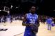 INDIANAPOLIS, IN - MARCH 30: Julius Randle #30 of the Kentucky Wildcats celebrates after defeating the Michigan Wolverines 75 to 72 in the midwest regional final of the 2014 NCAA Men's Basketball Tournament at Lucas Oil Stadium on March 30, 2014 in India