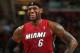 CLEVELAND, OH - MARCH 18: LeBron James #6 of the Miami Heat smiles during the game against the Cleveland Cavaliers at The Quicken Loans Arena on March 18, 2014 in Cleveland, Ohio. NOTE TO USER: User expressly acknowledges and agrees that, by downloading