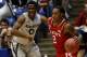 DAYTON, OH - MARCH 18: Anthony Barber #2 of the North Carolina State Wolfpack drives against Semaj Christon #0 of the Xavier Musketeers in the first half during the first round of the 2014 NCAA Men's Basketball Tournament at at University of Dayton Arena