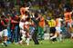 FORTALEZA, BRAZIL - JUNE 14: Costa Rica players celebrate with head coach Jorge Luis Pinto after their teams third goal during the 2014 FIFA World Cup Brazil Group D match between Uruguay and Costa Rica at Castelao on June 14, 2014 in Fortaleza, Brazil