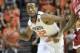Feb 15, 2014; Stillwater, OK, USA; Oklahoma State Cowboys guard Markel Brown (22) dribbles the ball as Oklahoma Sooners forward Cameron Clark (21) defends during the second half at Gallagher-Iba Arena. Oklahoma won 77-74. Mandatory Credit: Alonzo Adams-US