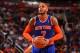 PHOENIX, AZ - MARCH 28: Carmelo Anthony #7 of the New York Knicks shoots a free throw during the game against the Phoenix Suns on March 28, 2014 at U.S. Airways Center in Phoenix, Arizona. NOTE TO USER: User expressly acknowledges and agrees that, by down
