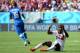 RECIFE, BRAZIL - JUNE 20: Joel Campbell of Costa Rica reacts after a challenge by Giorgio Chiellini and Andrea Barzagli (not pictured) of Italy during the 2014 FIFA World Cup Brazil Group D match between Italy and Costa Rica at Arena Pernambuco on June 2