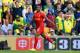 NORWICH, ENGLAND - APRIL 20: Raheem Sterling of Liverpool celebrates scoring their third goal during the Barclays Premier League match between Norwich City and Liverpool at Carrow Road on April 20, 2014 in Norwich, England. (Photo by Michael Regan/Getty
