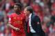 LIVERPOOL, ENGLAND - APRIL 27: Liverpool manager Brendan Rodgers gives instructions to Raheem Sterling during the Barclays Premier League match between Liverpool and Chelsea at Anfield on April 27, 2014 in Liverpool, England. (Photo by Clive Brunskill/Ge