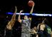 SAN ANTONIO, TX - MARCH 23: Doug McDermott #3 of the Creighton Bluejays takes a shot as Rico Gathers #2 and Isaiah Austin #21 of the Baylor Bears defend during the third round of the 2014 NCAA Men's Basketball Tournament at the AT&T Center on March 23, 2