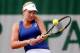 PARIS, FRANCE - MAY 29: Coco Vandeweghe of the United States returns a shot during her women's singles match against Ekaterina Makarova of Russia on day five of the French Open at Roland Garros on May 29, 2014 in Paris, France. (Photo by Matthew Stockma