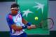 PARIS, FRANCE - JUNE 04: David Ferrer of Spain returns a shot during his men's singles match against Rafael Nadal of Spain on day eleven of the French Open at Roland Garros on June 4, 2014 in Paris, France. (Photo by Dan Istitene/Getty Images)