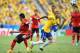 FORTALEZA, BRAZIL - JUNE 17: Dani Alves of Brazil turns Francisco Javier Rodriguez of Mexico during the 2014 FIFA World Cup Brazil Group A match between Brazil and Mexico at Castelao on June 17, 2014 in Fortaleza, Brazil. (Photo by Laurence Griffiths/Get
