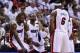 Jun 12, 2014; Miami, FL, USA; Miami Heat forward LeBron James (6) talks with center Chris Bosh (1), guard Dwyane Wade (3) during the second quarter of game four of the 2014 NBA Finals against the San Antonio Spurs at American Airlines Arena. Mandatory Cre