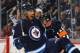 WINNIPEG, MB - OCTOBER 20: Evander Kane #9 of the Winnipeg Jets celebrates his third period goal against the Nashville Predators at the MTS Centre on October 20, 2013 in Winnipeg, Manitoba, Canada. (Photo by Jonathan Kozub/NHLI via Getty Images)