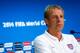MANAUS, BRAZIL - JUNE 21: Head coach Jurgen Klinsmann of the United States enters the room to speak to the media prior to training at Arena Amazonia on June 21, 2014 in Manaus, Brazil. (Photo by Kevin C. Cox/Getty Images)
