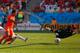 SAO PAULO, BRAZIL - JUNE 23: Memphis Depay of the Netherlands shoots and scores his team's second goal past goalkeeper Claudio Bravo of Chile during the 2014 FIFA World Cup Brazil Group B match between the Netherlands and Chile at Arena de Sao Paulo on J