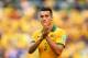CURITIBA, BRAZIL - JUNE 23: Jason Davidson of Australia acknowledges the fans after being defeated by Spain 3-0 during the 2014 FIFA World Cup Brazil Group B match between Australia and Spain at Arena da Baixada on June 23, 2014 in Curitiba, Brazil. (Ph