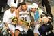 Jun 15, 2014; San Antonio, TX, USA; San Antonio Spurs guard Tony Parker (9) forward Tim Duncan (21) and Manu Ginobili (20) celebrate with the Larry O'Brien trophy after defeating the Miami Heat in game five of the 2014 NBA Finals at AT&T Center. The Spurs
