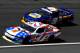 CHARLOTTE, NC - MAY 24: Regan Smith, driver of the #7 Fire Alarm Services Chevrolet, leads Chase Elliott, driver of the #9 NAPA AUTO PARTS Chevrolet, during qualifying for the NASCAR Nationwide Series History 300 at Charlotte Motor Speedway on May 24, 20