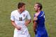 Italy defender Giorgio Chiellini shows off his bite marks after the Suarez incident.