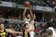 INDIANAPOLIS, IN - MARCH 09: Adreian Payne #5 of the Michigan State Spartans attempts a shot against the Iowa Hawkeyes during their quarterfinal game of 2012 Big Ten Men's Basketball Conferene Tournament at Bankers Life Fieldhouse on March 9, 2012 in Ind