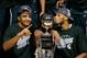 Mar 16, 2014; Indianapolis, IN, USA; Michigan State Spartans guard Gary Harris (left) and center Adreian Payne celebrate after defeating the Michigan Wolverines in the championship game for the Big Ten college basketball tournament at Bankers Life Fieldho