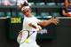 LONDON, ENGLAND - JUNE 24: Roger Federer of Switzerland plays a forehand during his Gentlemen's Singles first round match against Paolo Lorenzi of Italy on day two of the Wimbledon Lawn Tennis Championships at the All England Lawn Tennis and Croquet Club