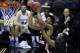 Mar 21, 2014; San Antonio, TX, USA; Louisiana Lafayette Ragin Cajuns guard Elfrid Payton (2) pulls down a rebound against the Creighton Bluejays in the second half of a men's college basketball game during the second round of the 2014 NCAA Tournament at A