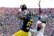 ANN ARBOR, MI - NOVEMBER 30: Tight end Devin Funchess #87 of the Michigan Wolverines catches a fourth quarter touchdown as cornerback Bradley Roby #1 of the Ohio State Buckeyes defends during a game at Michigan Stadium on November 30, 2013 in Ann Arbor,