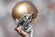SOUTH BEND, IN - OCTOBER 07: A member of Notre Dame Fighting Irish holds up his helmet on the opening kickoff during the game against the Stanford Cardinal on October 7, 2006 at Notre Dame Stadium in South Bend, Indiana. (Photo by Andy Lyons/Getty Image