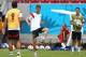 RECIFE, BRAZIL - JUNE 25: Thomas Mueller (C) of Germany runs with the ball during the Germany training session ahead of the 2014 FIFA World Cup Group G match between USA and Germany held at Arena Pernambuco on June 25, 2014 in Recife, Brazil. (Photo by M