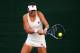 LONDON, ENGLAND - JUNE 24: Chanelle Scheepers of South Africa in action during her Ladies' Singles first round match against Christina McHale of the United States on day two of the Wimbledon Lawn Tennis Championships at the All England Lawn Tennis and Cr