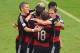 RECIFE, BRAZIL - JUNE 26: Thomas Mueller of Germany celebrates scoring his team's first goal with teammates during the 2014 FIFA World Cup Brazil group G match between the United States and Germany at Arena Pernambuco on June 26, 2014 in Recife, Brazil.