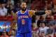 Apr 6, 2014; Miami, FL, USA; New York Knicks center Tyson Chandler (6) reacts during the first half against the Miami Heat at American Airlines Arena. Mandatory Credit: Steve Mitchell-USA TODAY Sports