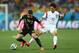 SAO PAULO, BRAZIL - JUNE 26: Eden Hazard of Belgium and Lee Chung-Yong of South Korea compete for the ball during the 2014 FIFA World Cup Brazil Group H match between South Korea and Belgium at Arena de Sao Paulo on June 26, 2014 in Sao Paulo, Brazil. (