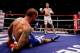 GLASGOW, SCOTLAND - SEPTEMBER 22: Ricky Burns knocks down Kevin Mitchell during the WBO World Lightweight Championship match at SECC on September 22, 2012 in Glasgow, Scotland. (Photo by Scott Heavey/Getty Images)
