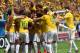 BRASILIA, BRAZIL - JUNE 23: Fernandinho of Brazil (obscured) celebrates scoring his team's fourth goal with teammates during the 2014 FIFA World Cup Brazil Group A match between Cameroon and Brazil at Estadio Nacional on June 23, 2014 in Brasilia, Brazil