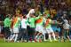 CURITIBA, BRAZIL - JUNE 26: Algeria celebrate after a 1-1 draw during the 2014 FIFA World Cup Brazil Group H match between Algeria and Russia at Arena da Baixada on June 26, 2014 in Curitiba, Brazil. (Photo by Julian Finney/Getty Images)
