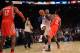 NEW YORK, NY - NOVEMBER 14: A personal foul is called on James Harden #13 of the Houston Rockets while Carmelo Anthony #7 of the New York Knicks takes a shot with five seconds left in the game at Madison Square Garden on November 14, 2013 in New York Ci