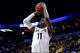 ST LOUIS, MO - MARCH 21: Cleanthony Early #11 of the Wichita State Shockers takes a shot against the Cal Poly Mustangs during the second round of the 2014 NCAA Men's Basketball Tournament at the Scottrade Center on March 21, 2014 in St Louis, Missouri.
