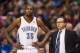 Jan 25, 2014; Philadelphia, PA, USA; Oklahoma City Thunder head coach Scott Brooks talks with forward Kevin Durant (35) during the second quarter against the Philadelphia 76ers at the Wells Fargo Center. Mandatory Credit: Howard Smith-USA TODAY Sports