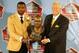 August 4, 2012; Canton, OH, USA; New York Jets former running back Curtis Martin (left) is presented his bust by former coach Bill Parcells during the 2012 Pro Football Hall of Fame enshrinement ceremonies at Fawcett Stadium. Mandatory Credit: Charles LeC