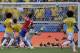 Pinilla's shot hits the bar late.